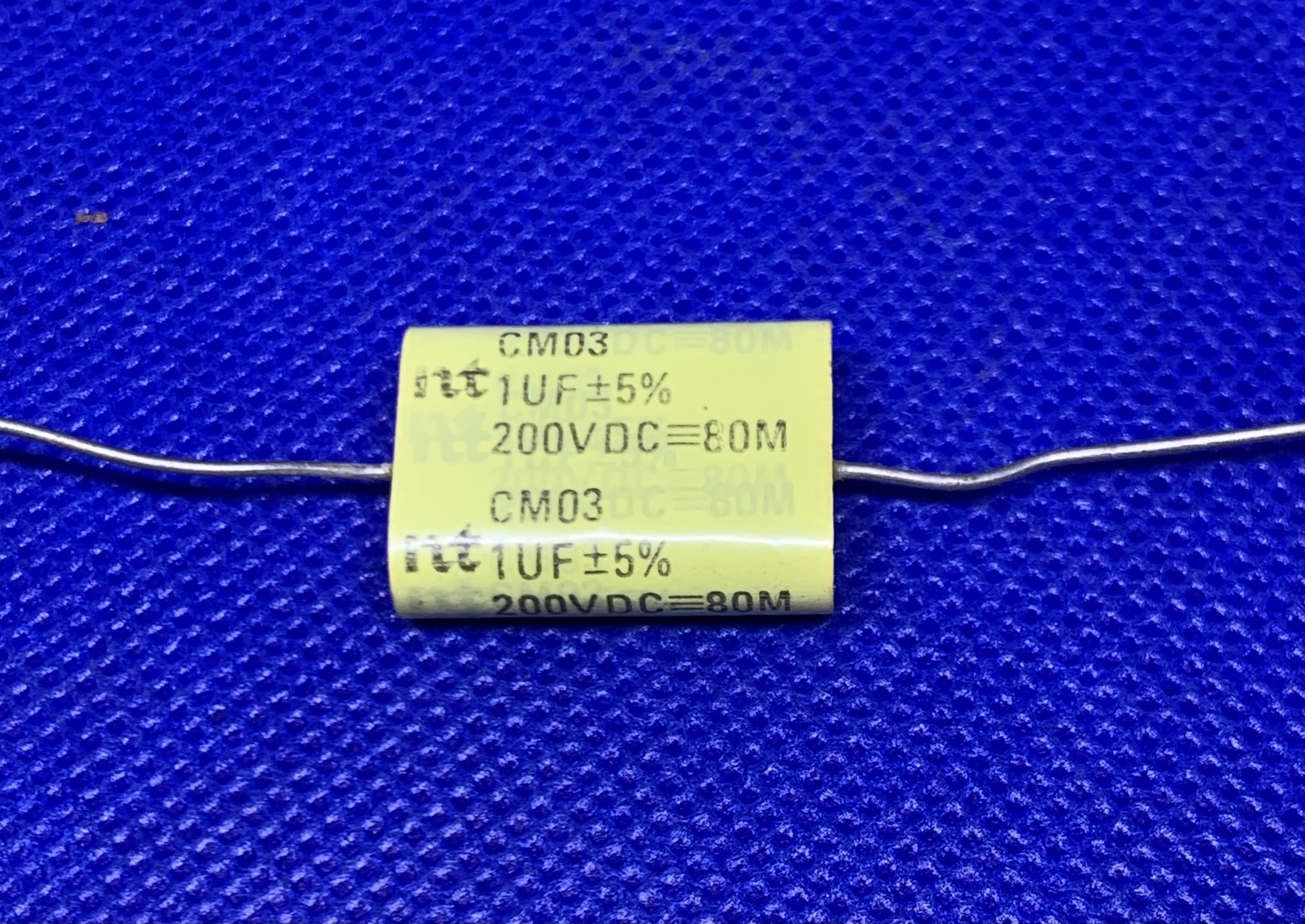NT CM03 1UF 5% 200VDC Axial Lead Yellow Film Capacitor - EcoTech Solutions Inc.