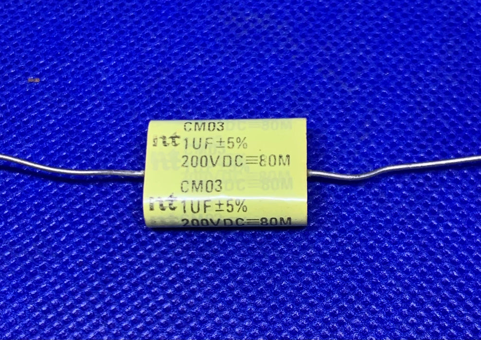 NT CM03 1UF 5% 200VDC Axial Lead Yellow Film Capacitor